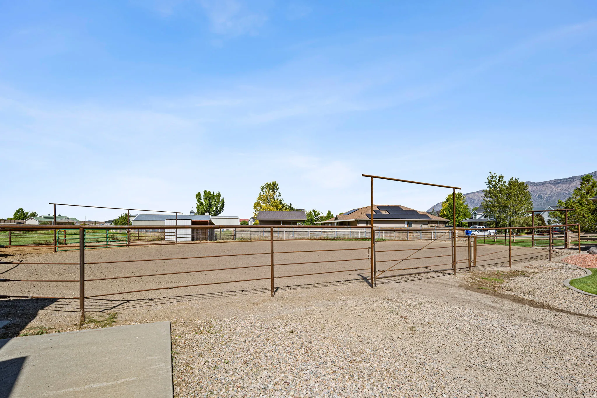 View of yard with an enclosed horse arena