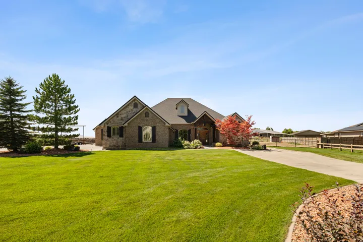View of front of house featuring brick siding