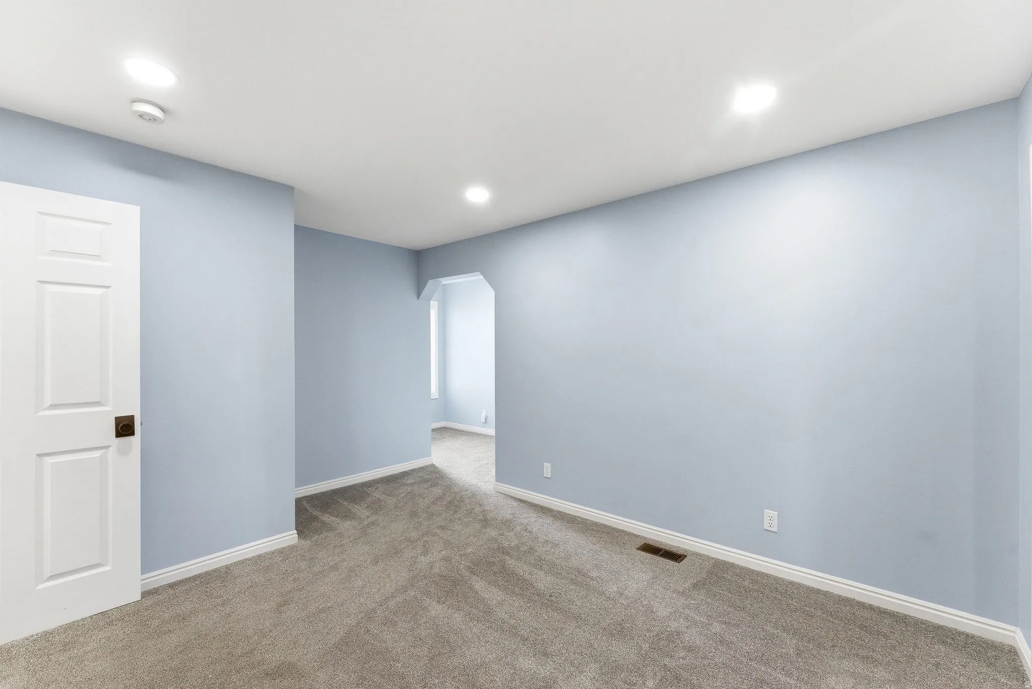 Generous bedroom layout with an extended area that works well as a workspace, reading nook, or additional living space.