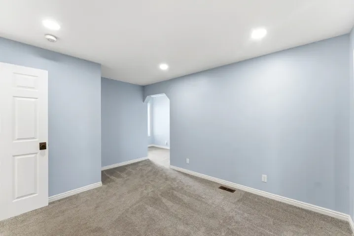 Generous bedroom layout with an extended area that works well as a workspace, reading nook, or additional living space.