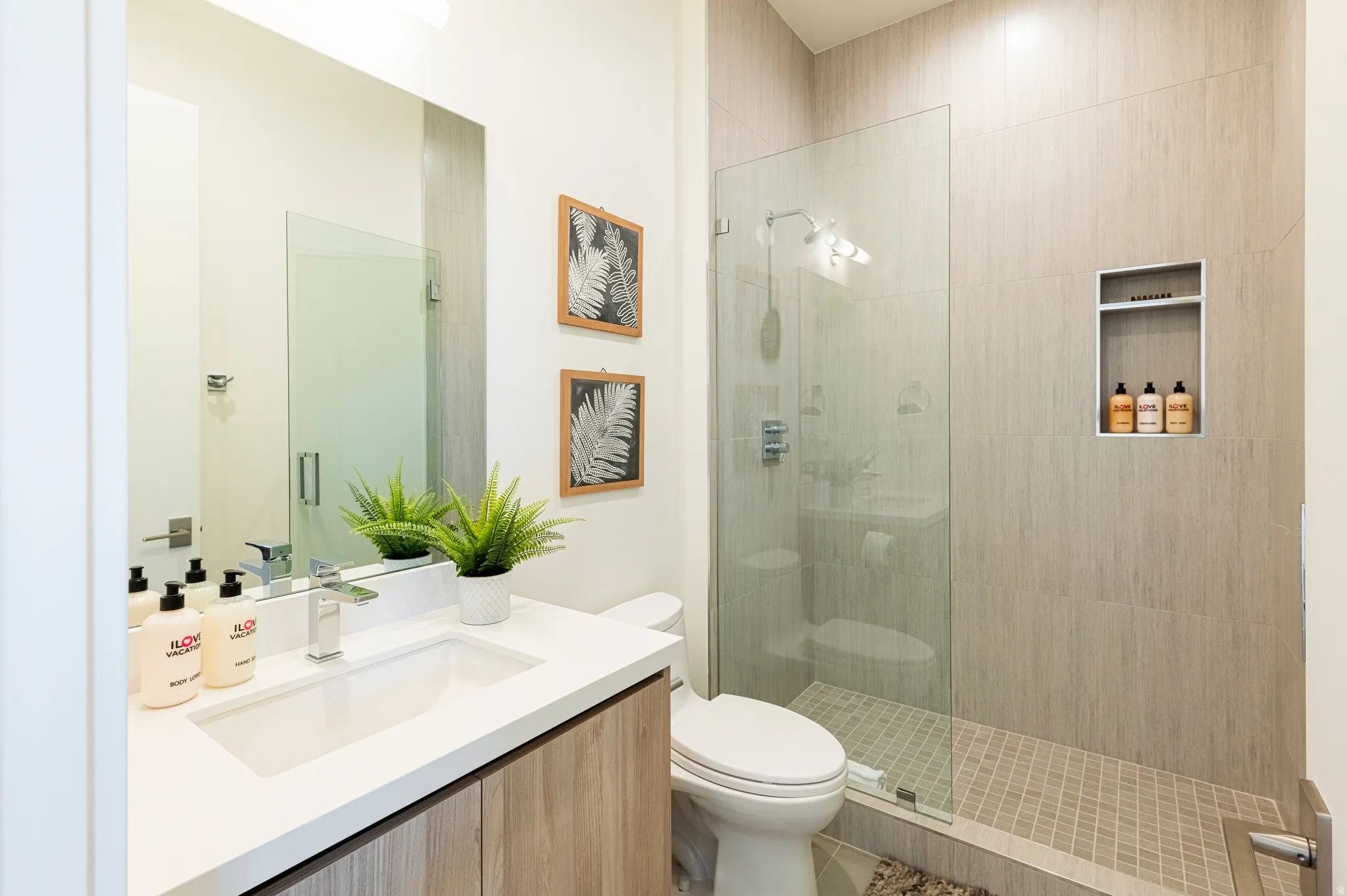 Bathroom with vanity and walk in shower