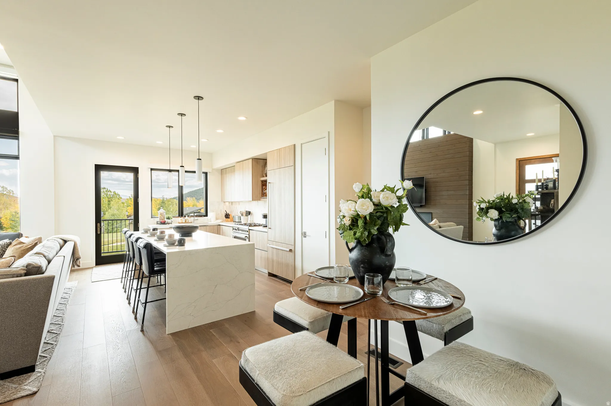Dining space featuring light wood-style flooring and recessed lighting