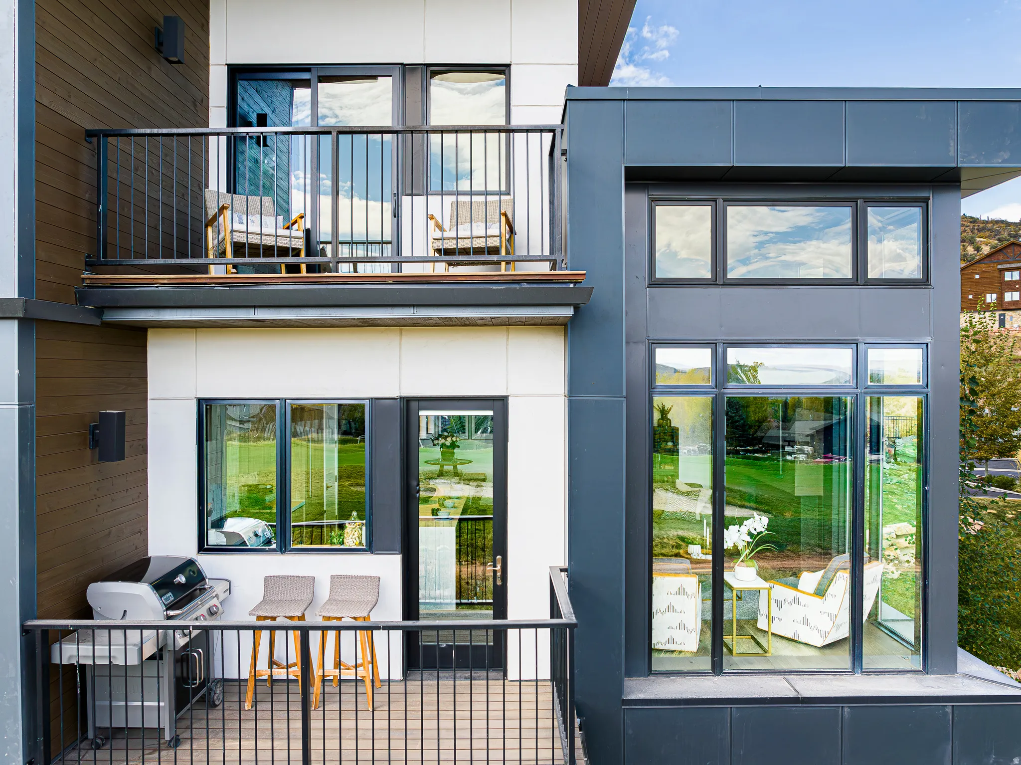 Rear view of house featuring a balcony