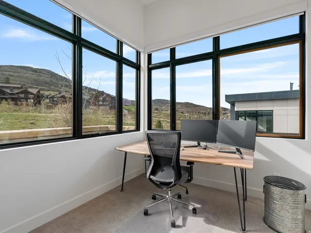 Carpeted office or bedroom