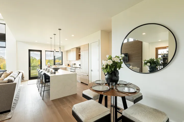 Dining space featuring light wood-style flooring and recessed lighting