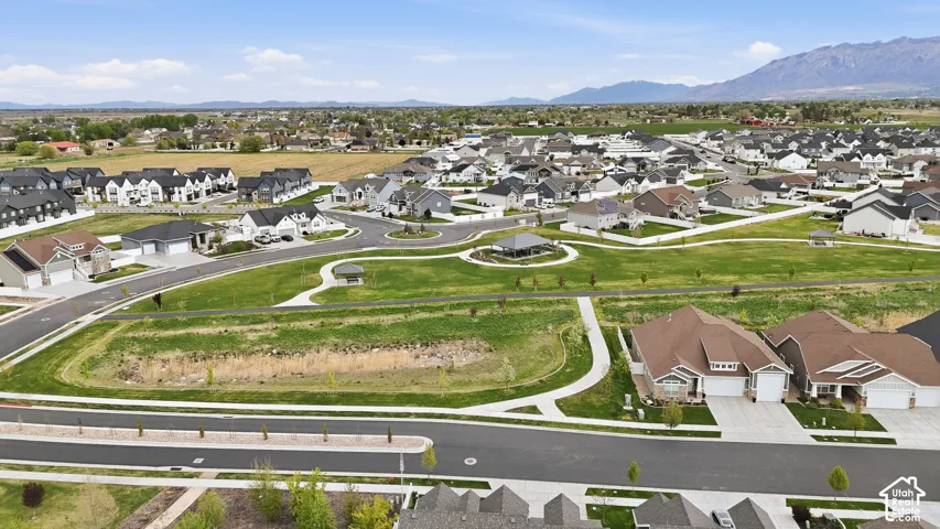 Aerial view of residential area with a mountainous background