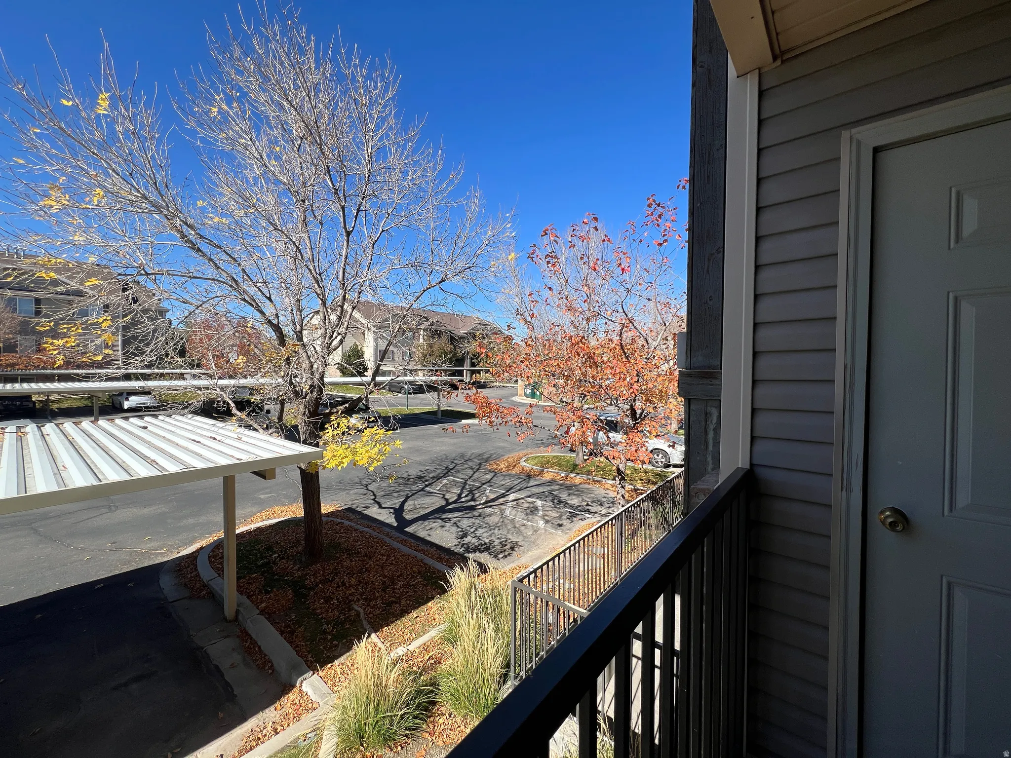 Balcony featuring a residential view