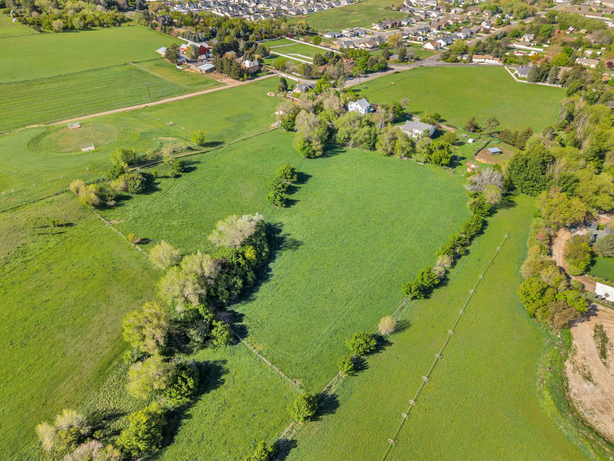 Aerial view of sparsely populated area with a pastoral area