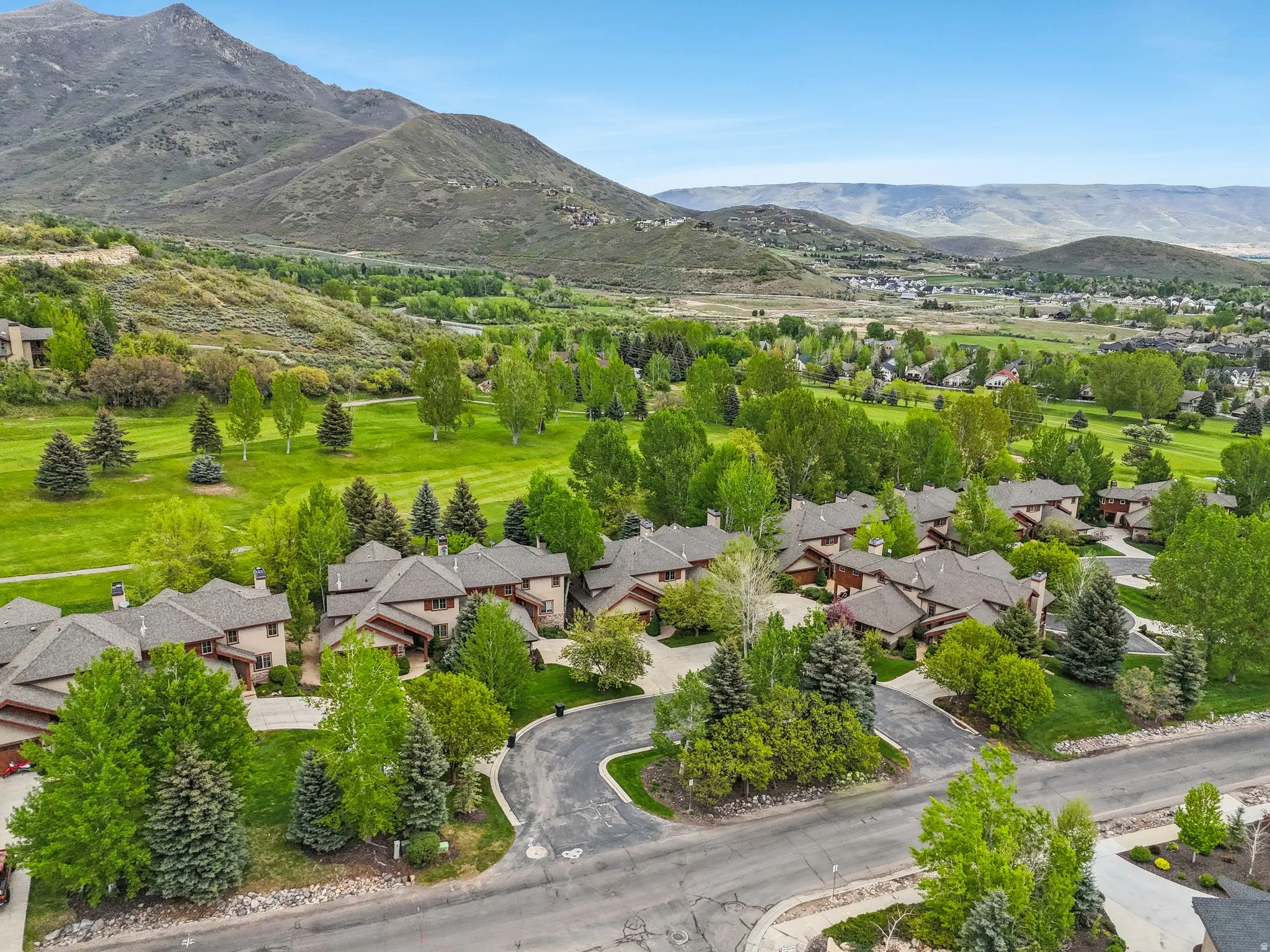 Aerial perspective of suburban area featuring mountains