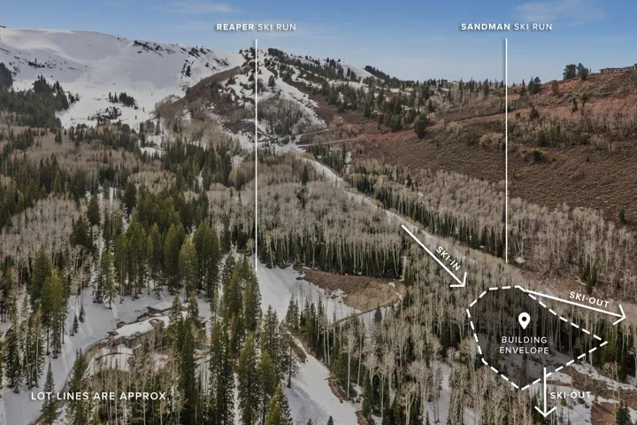 Aerial view of property and surrounding area featuring a mountainous background and property parcel outlined