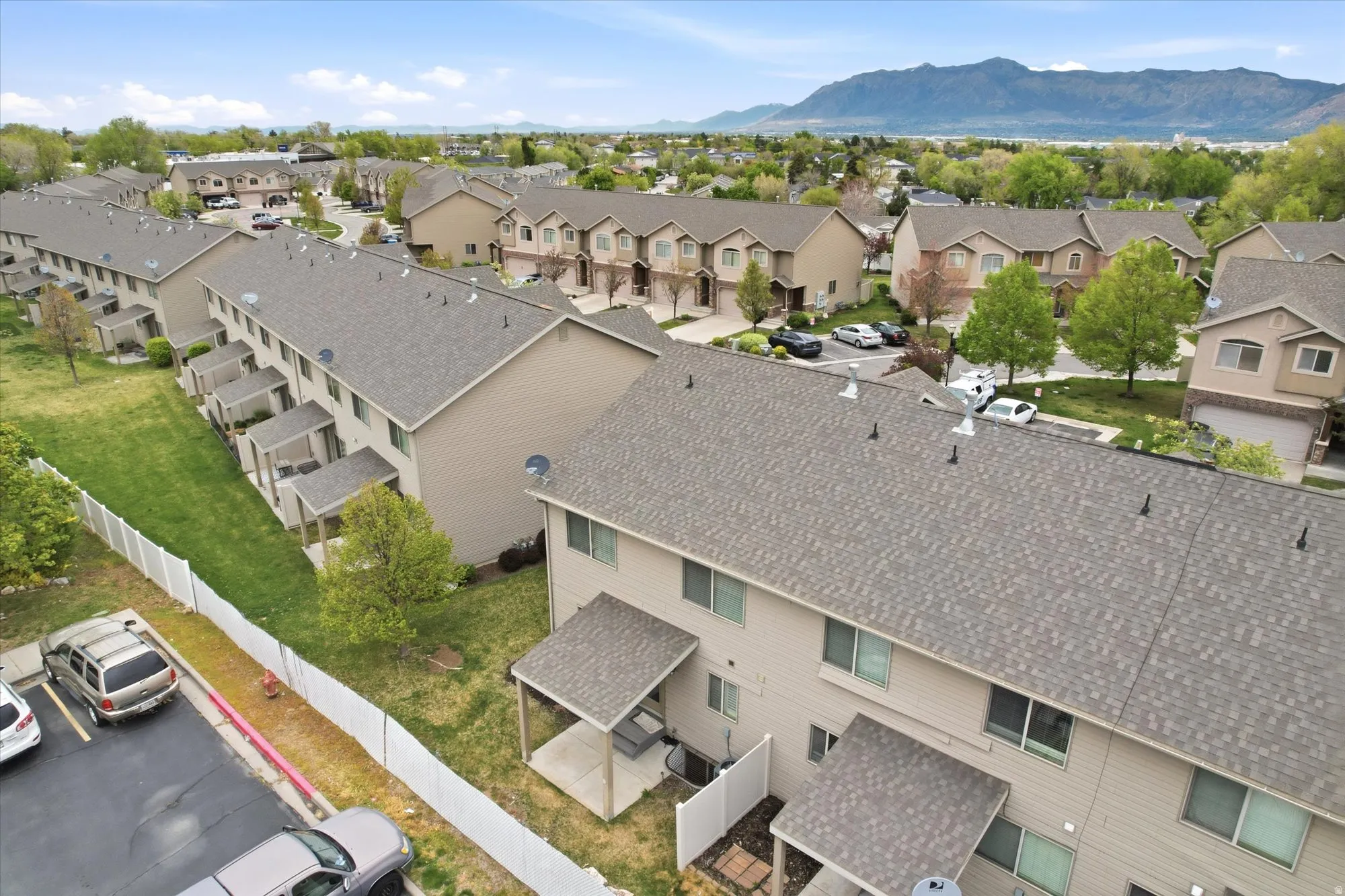 Aerial perspective of suburban area featuring mountains
