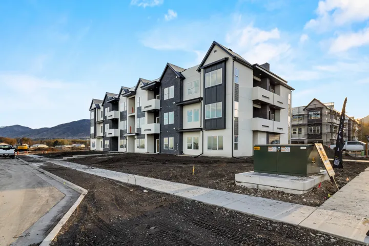 View of property with a mountain view