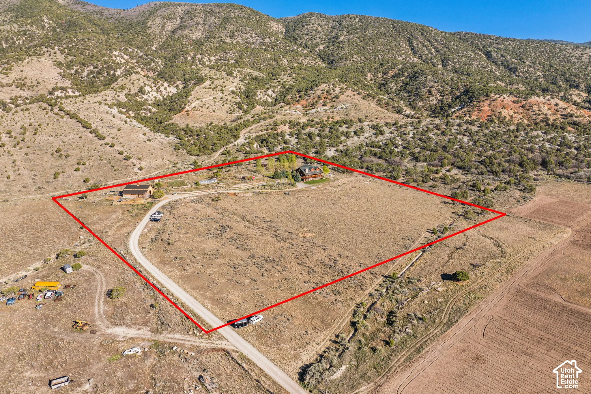 View of rural area featuring property parcel outlined and a mountain backdrop