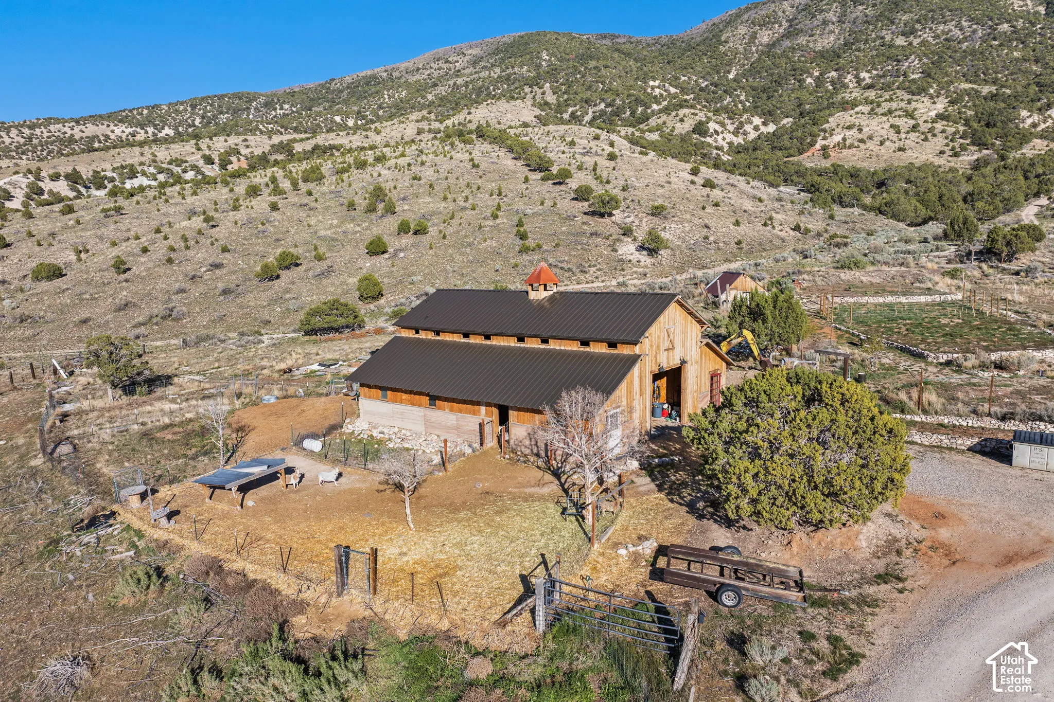Aerial view of sparsely populated area featuring a mountainous background