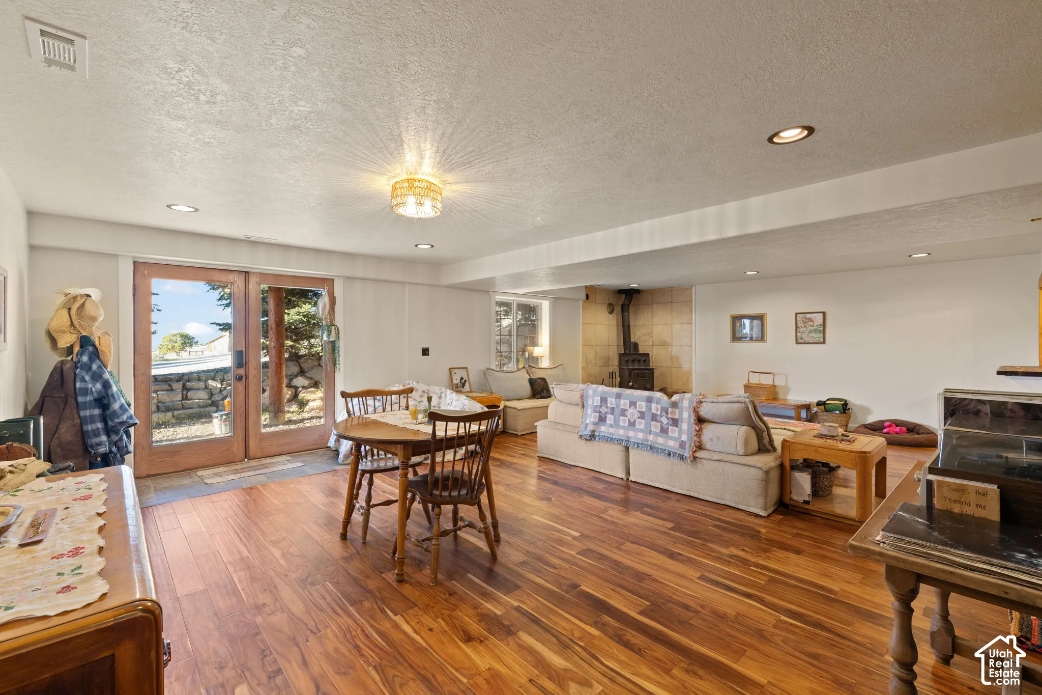 Large great room with coal/wood burning stove. Separate basement entrance, ideal for ADU