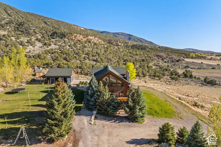 View of subject property with mountains