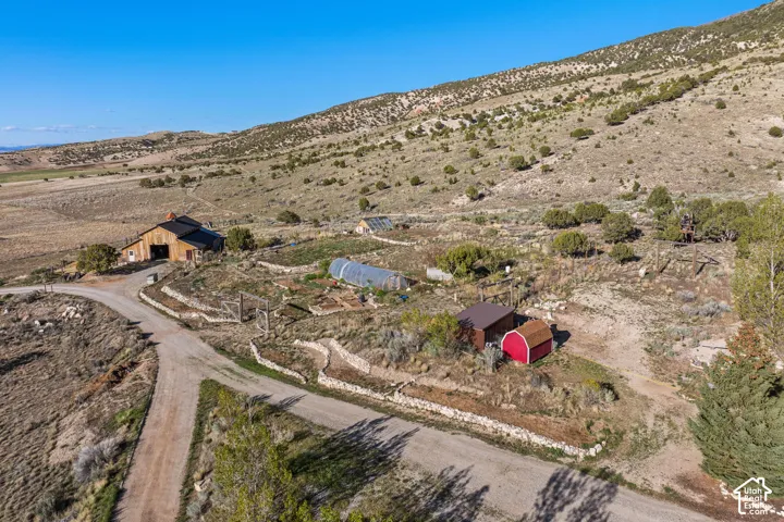 Aerial view of sparsely populated area featuring a mountainous background