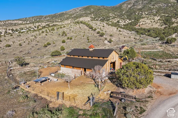 Aerial view of sparsely populated area featuring a mountainous background