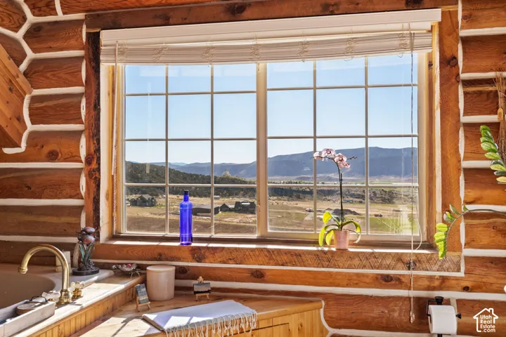 Primary ensuite with large, jetted tup with stunning valley views