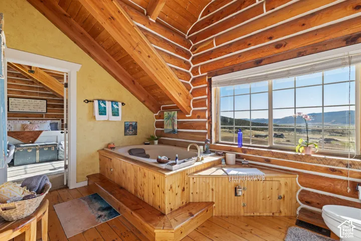 Primary ensuite with large, jetted tup with stunning valley views