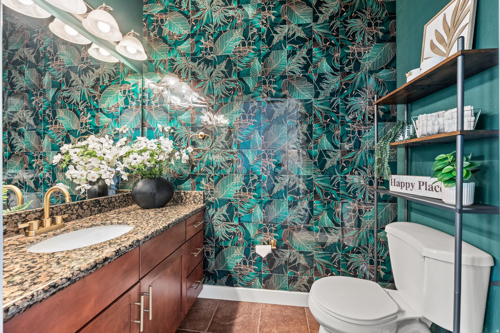 Half bath with wallpapered walls and vanity