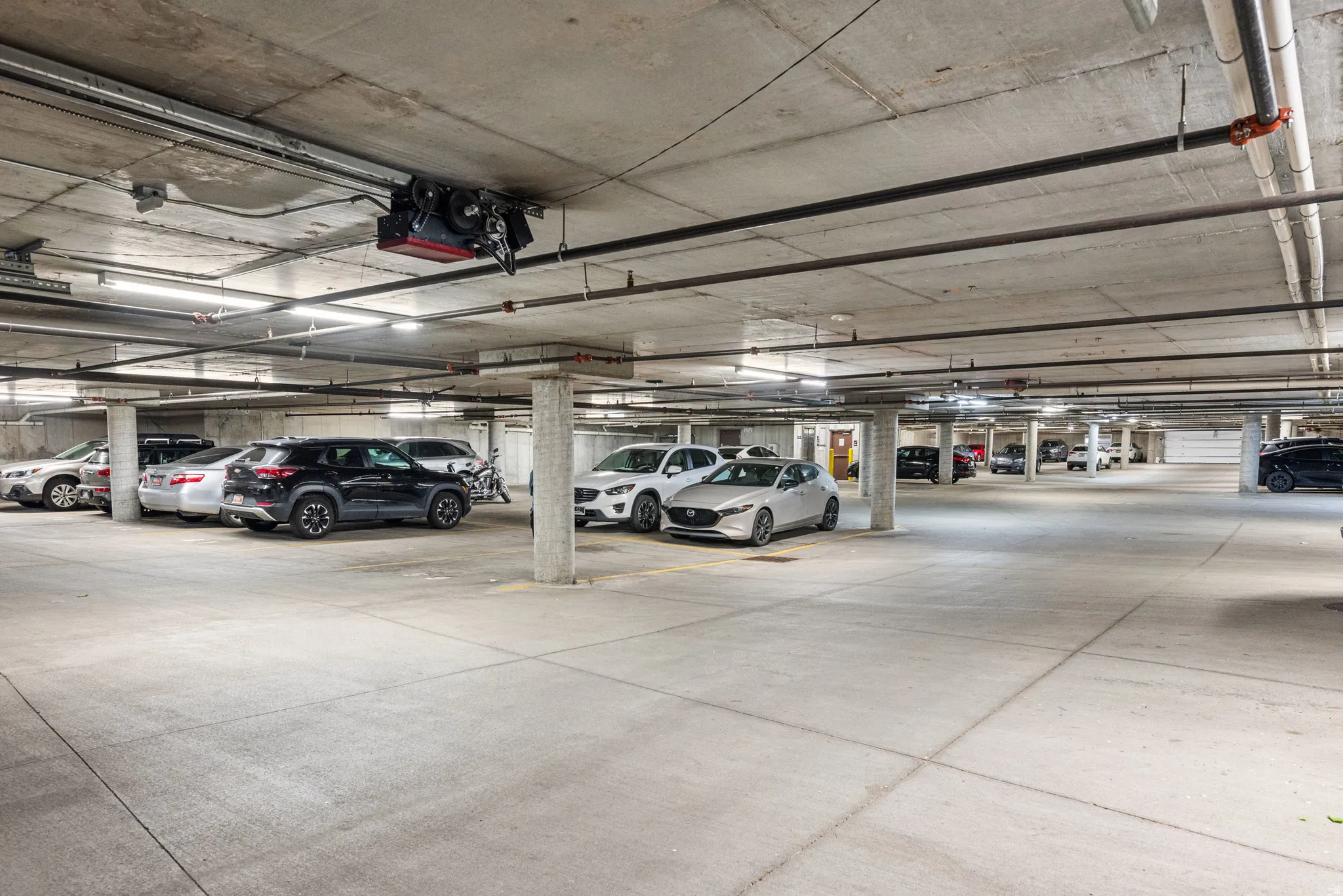 Garage featuring a parking garage