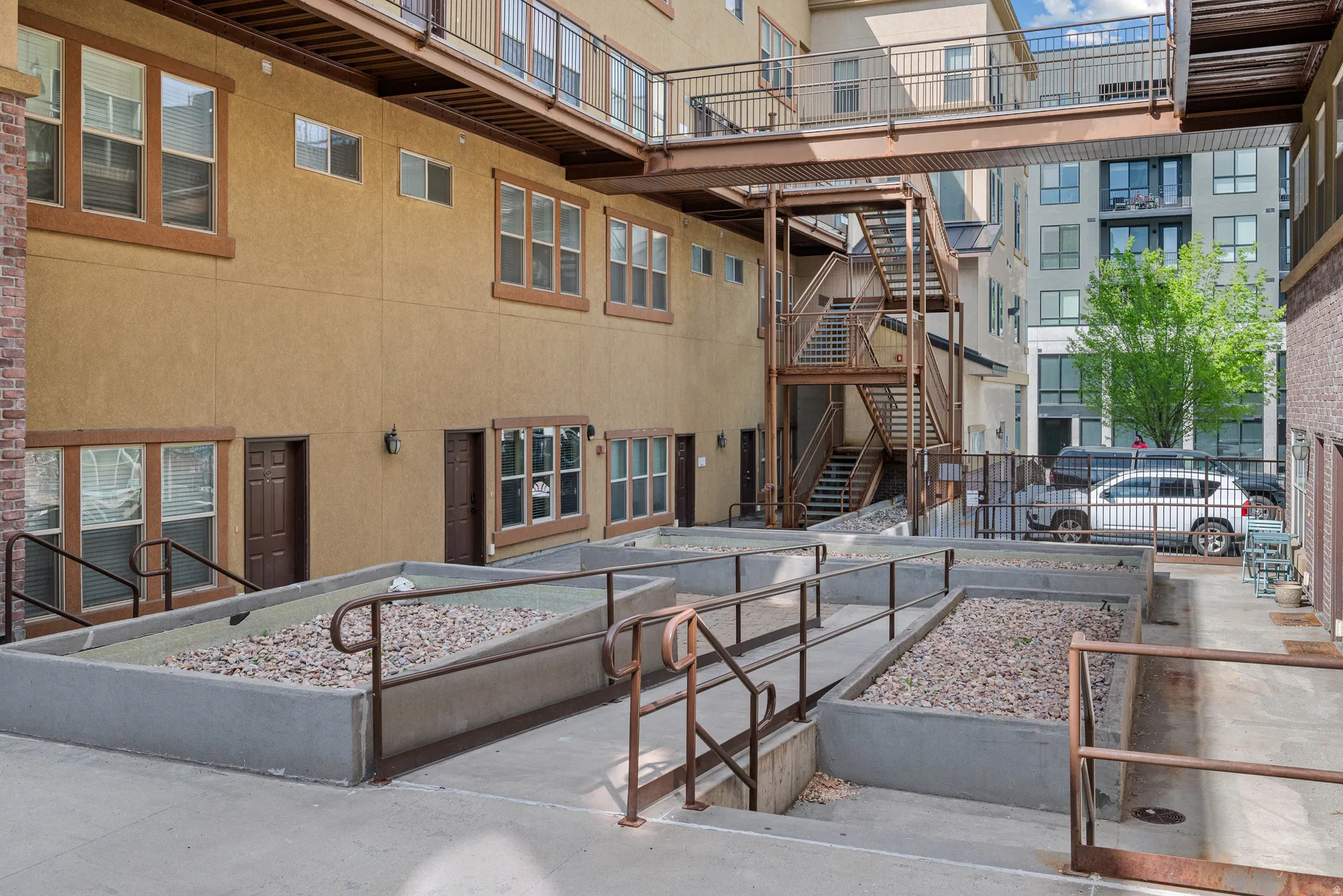 View of property's community featuring stairway and a vegetable garden