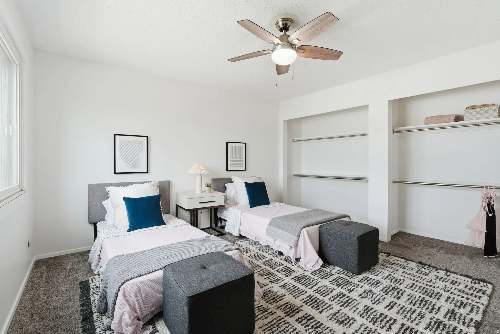 Bedroom with carpet and a ceiling fan