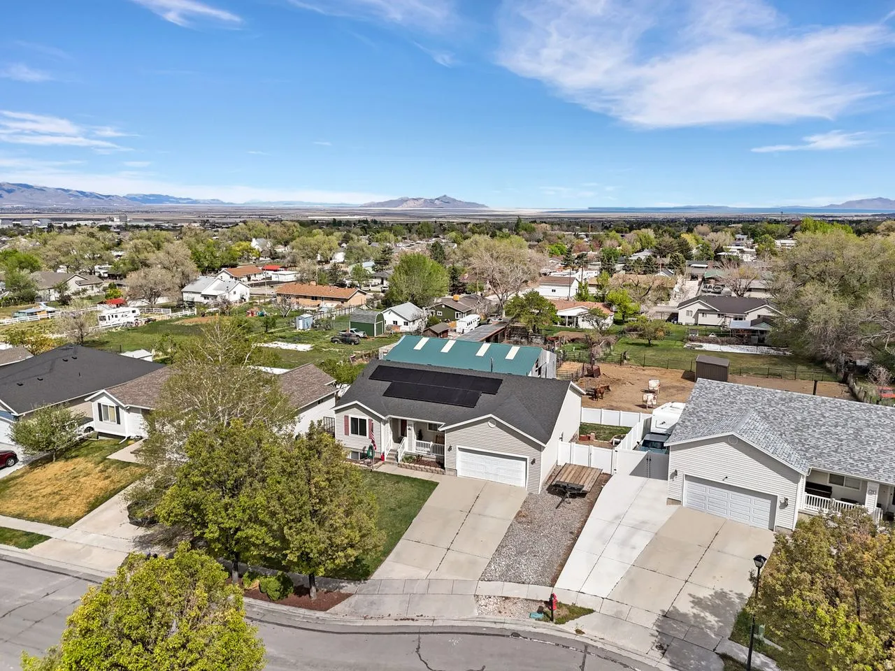 Aerial view of residential area with a mountain backdrop