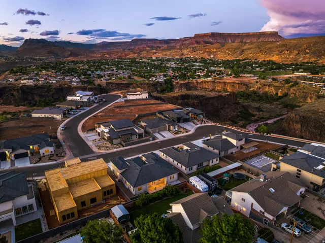 Aerial view at dusk of a residential view and a mountain view