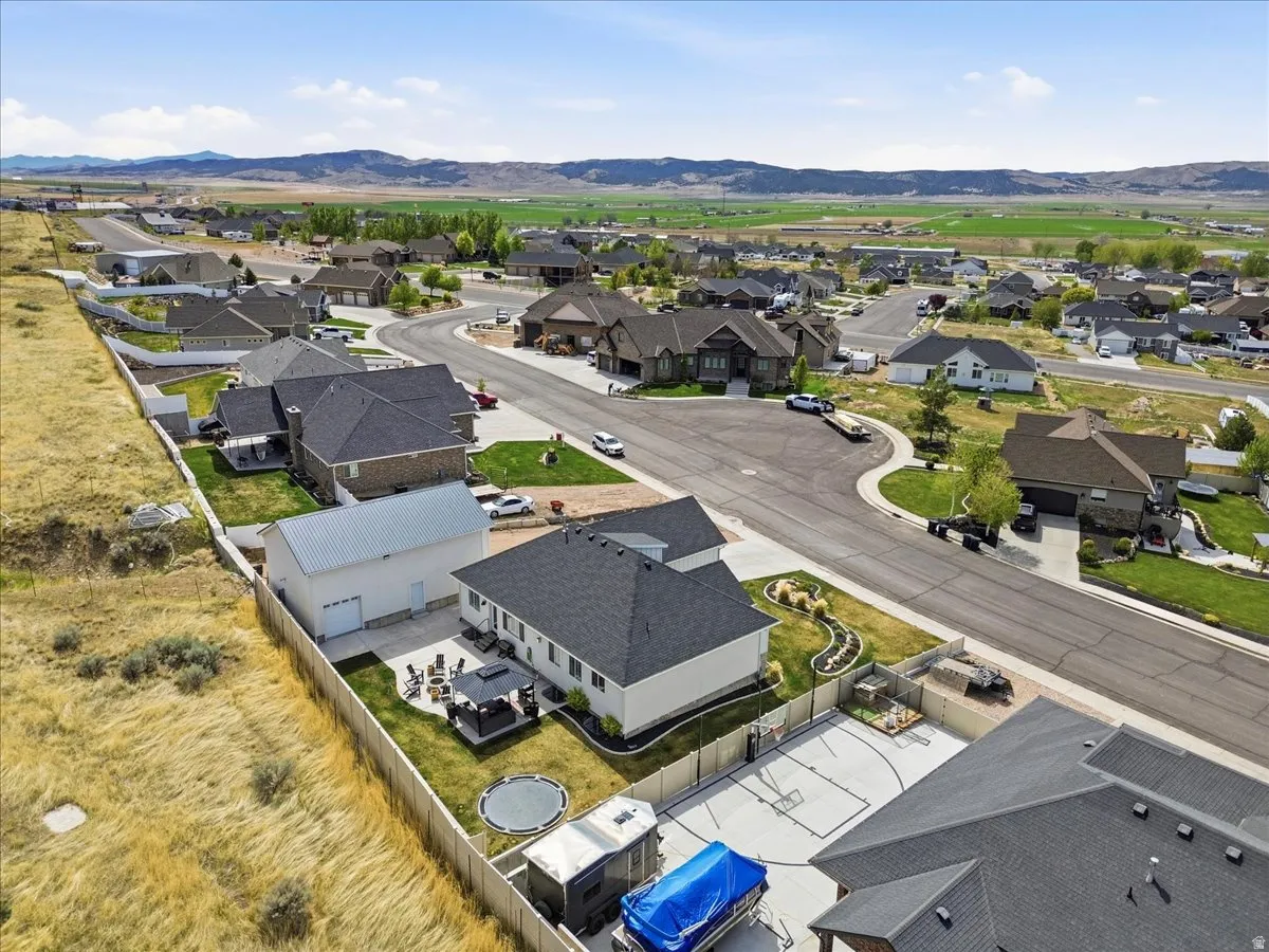 Aerial perspective of suburban area with mountains