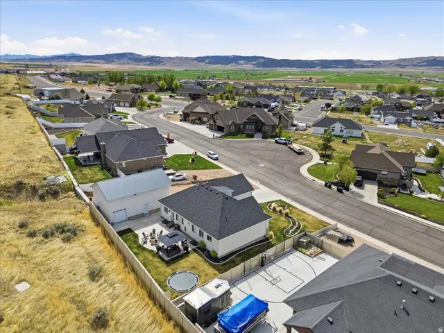 Aerial perspective of suburban area with mountains