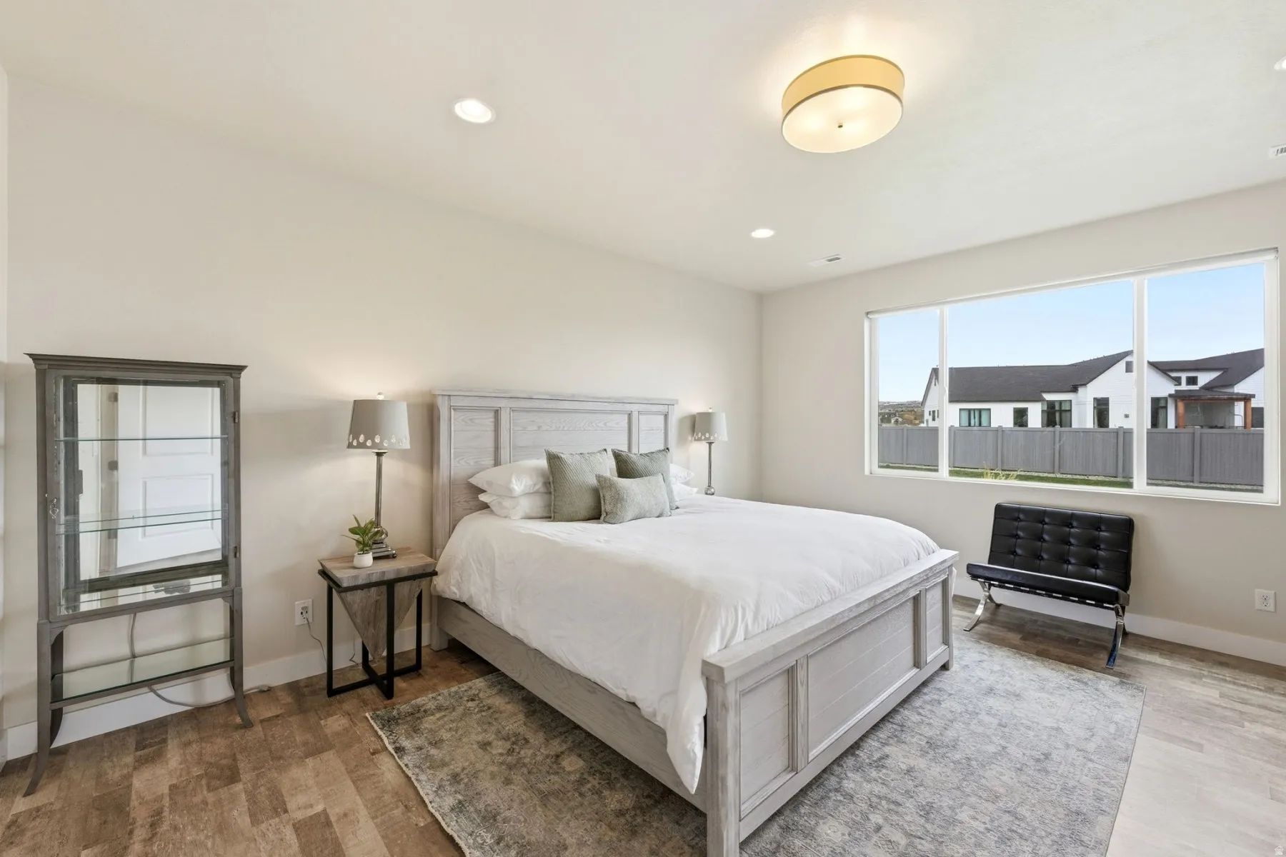 Bedroom featuring light wood finished floors and recessed lighting