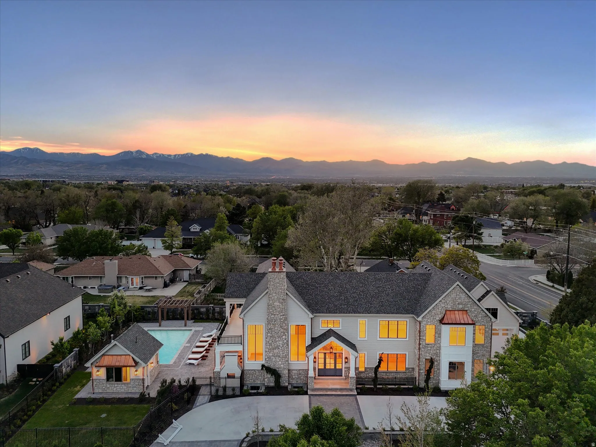 Aerial view at dusk of a mountain view and a residential view