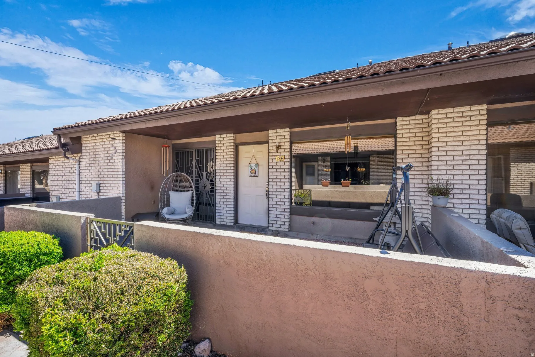 Property entrance with brick siding