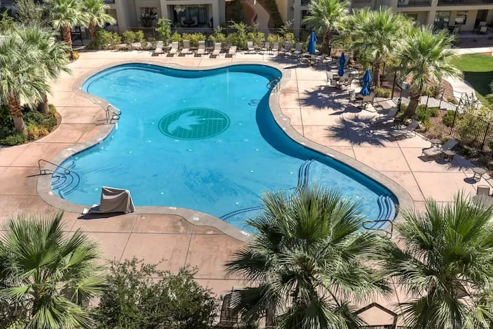 Community pool featuring a patio area