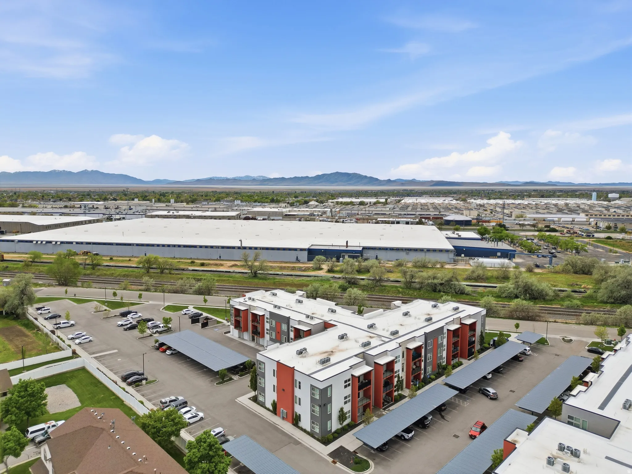 Bird's eye view of a mountain backdrop and industrial structures