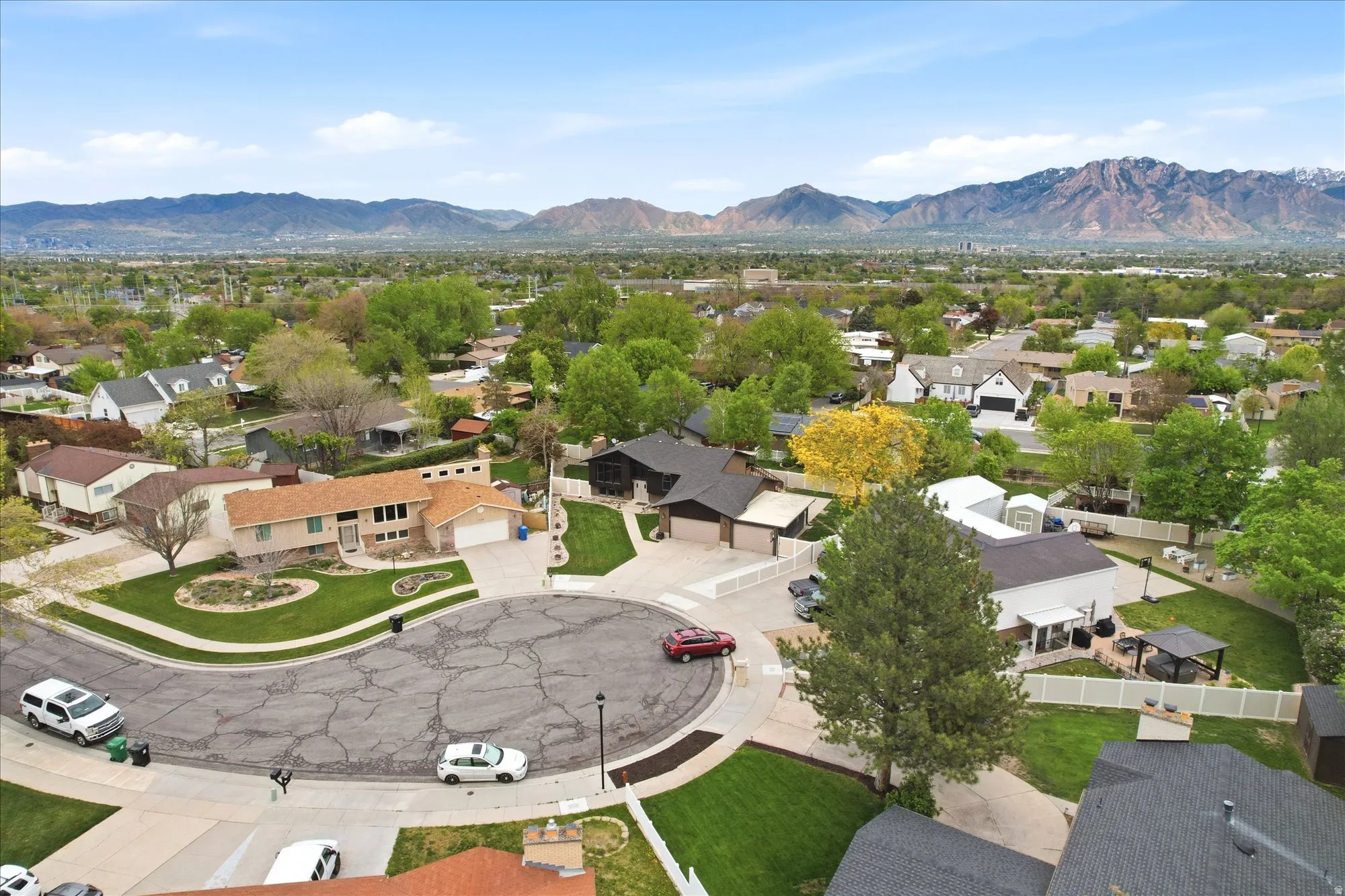 Aerial view of residential area featuring mountains