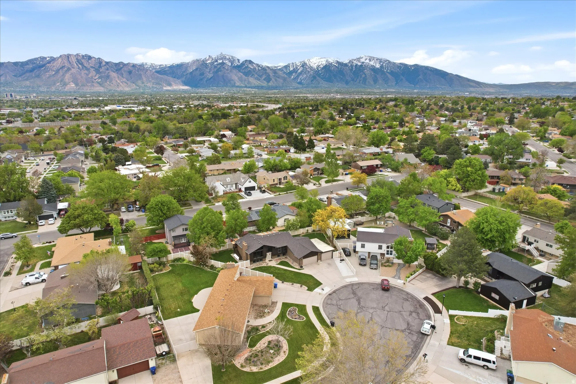 Aerial view of residential area with mountains