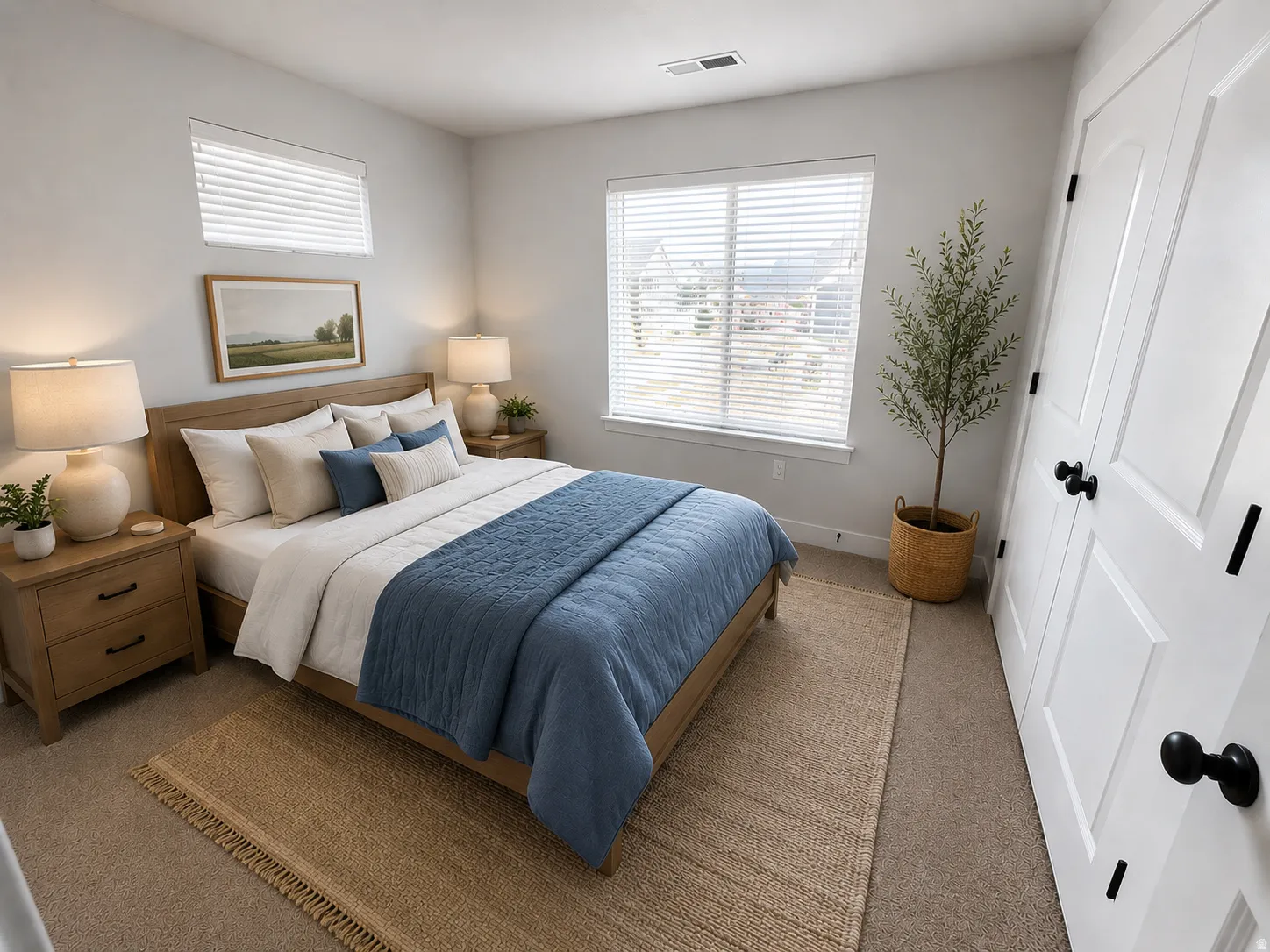 Bedroom featuring carpeted flooring and white walls