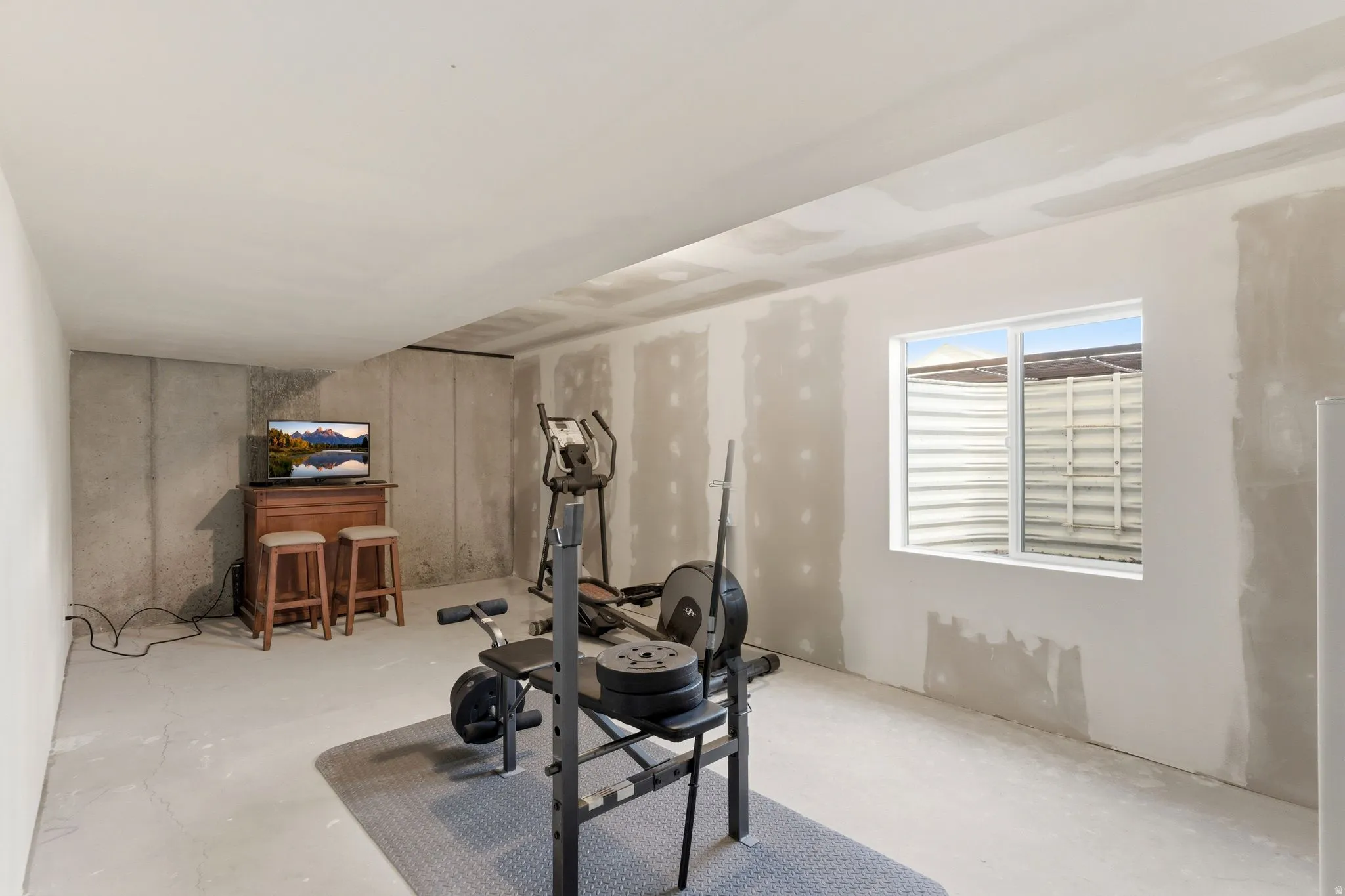 Workout area with concrete flooring