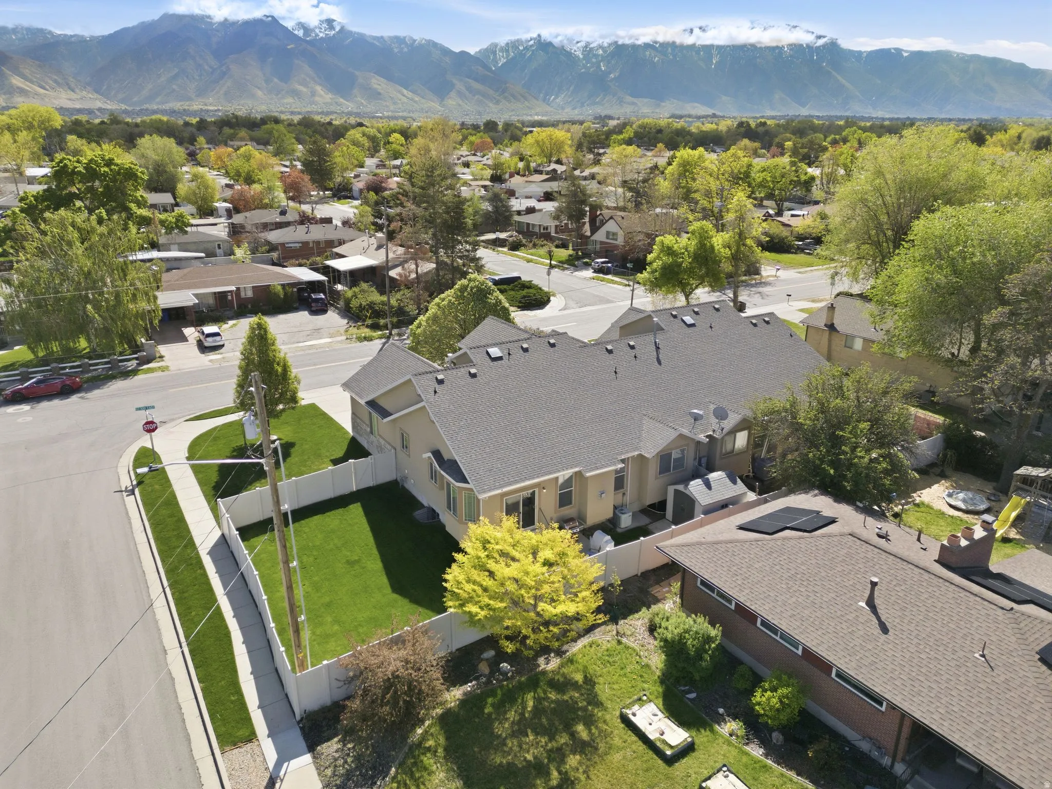 Aerial view of residential area with a mountain backdrop
