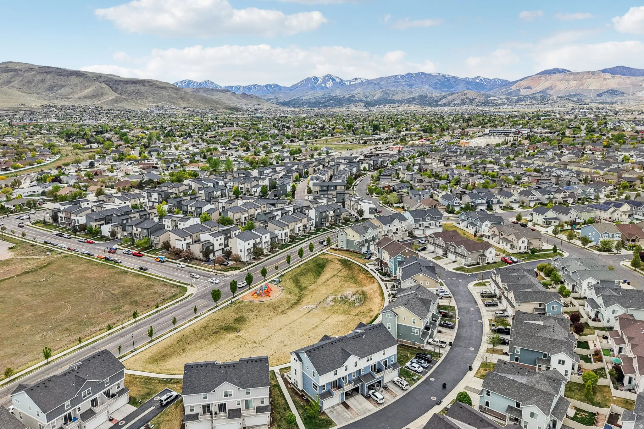 Aerial perspective of suburban area featuring mountains