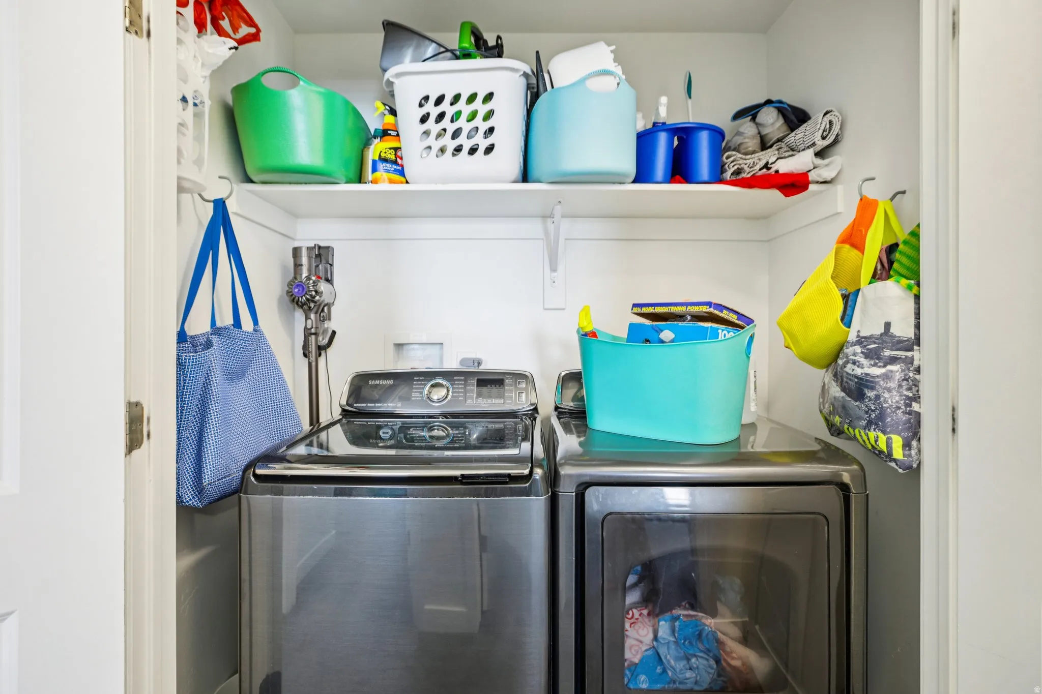 Laundry area featuring independent washer and dryer