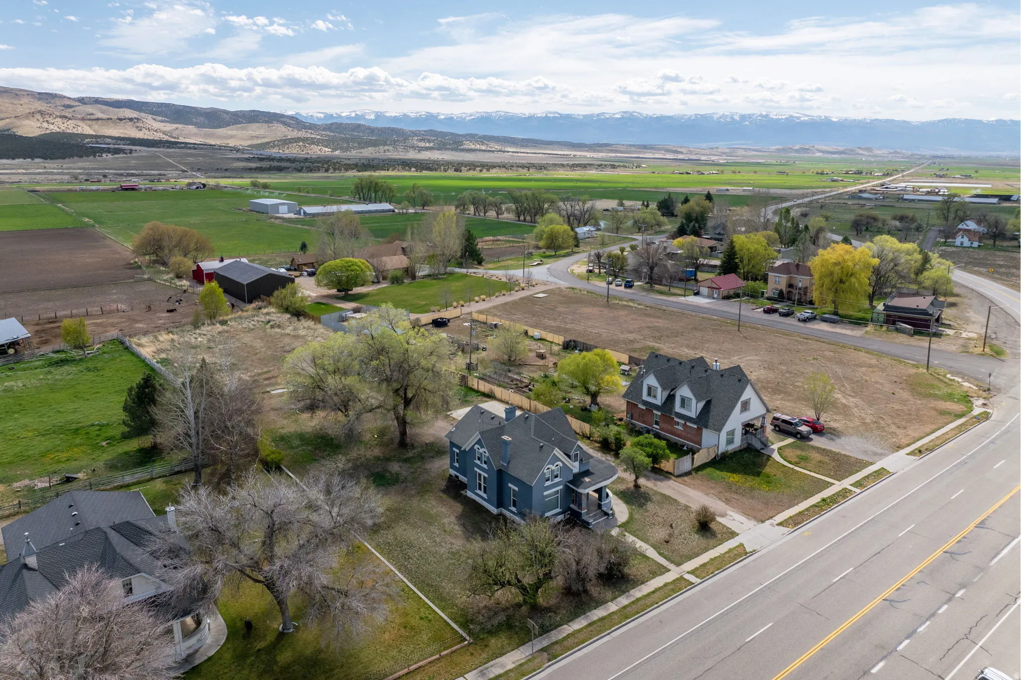 Aerial perspective of suburban area featuring mountains