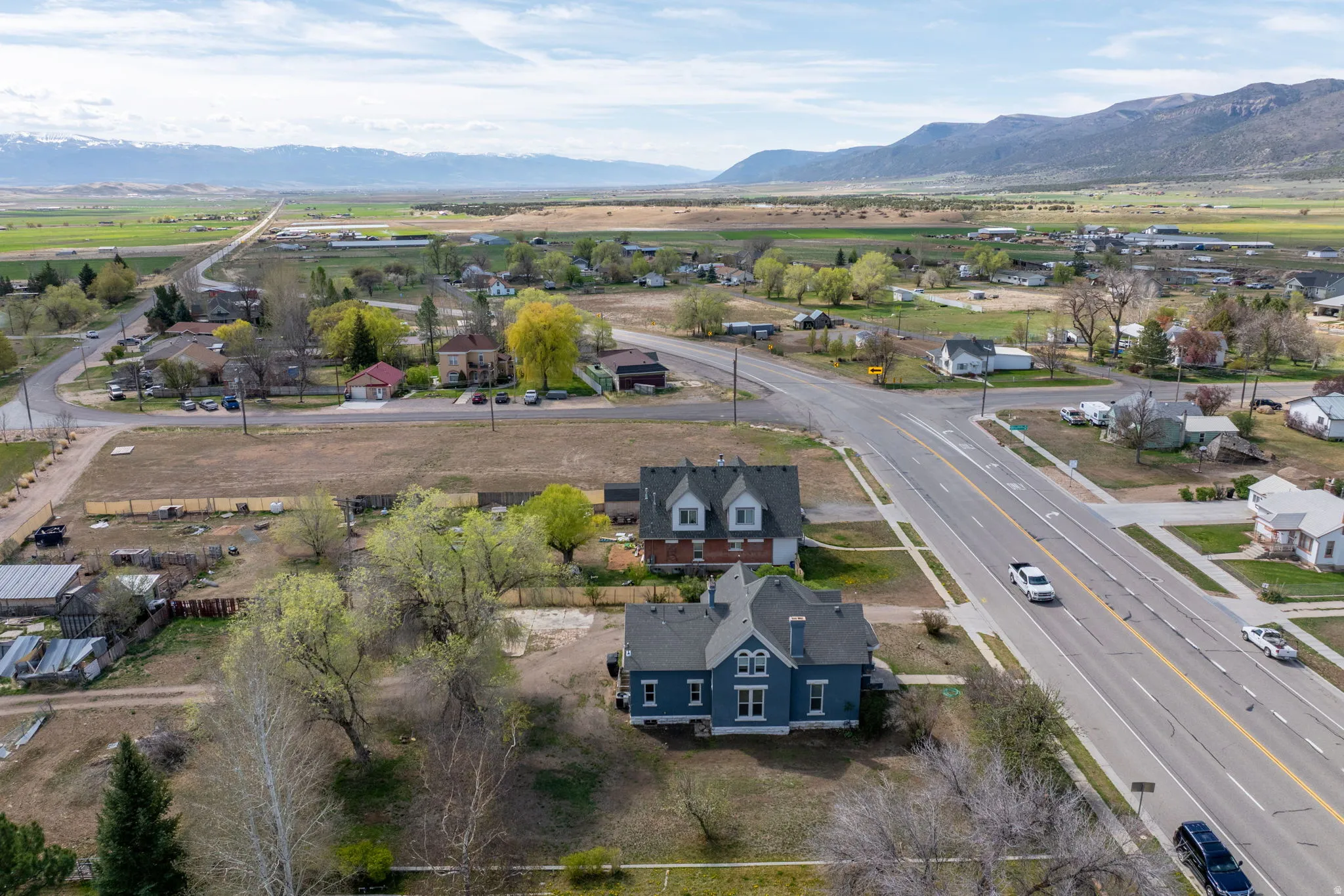 Aerial view of residential area with a mountain backdrop