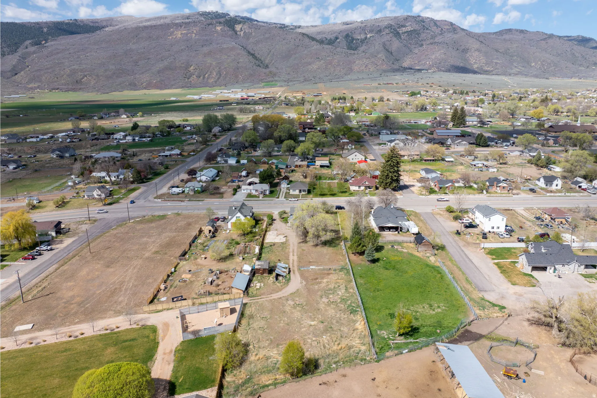 Aerial perspective of suburban area with mountains