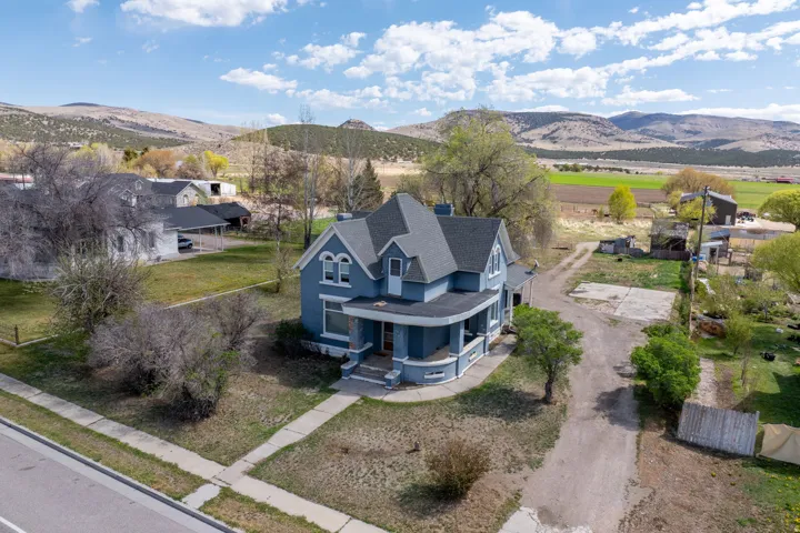 View from above of property with a mountainous background