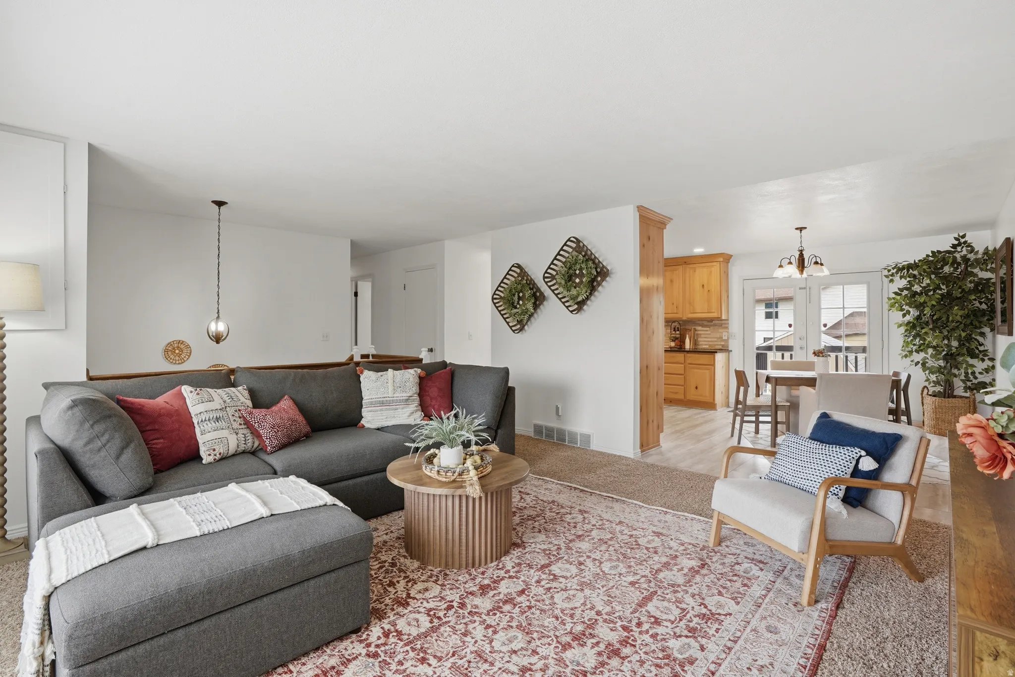 Living area with suspended lighting