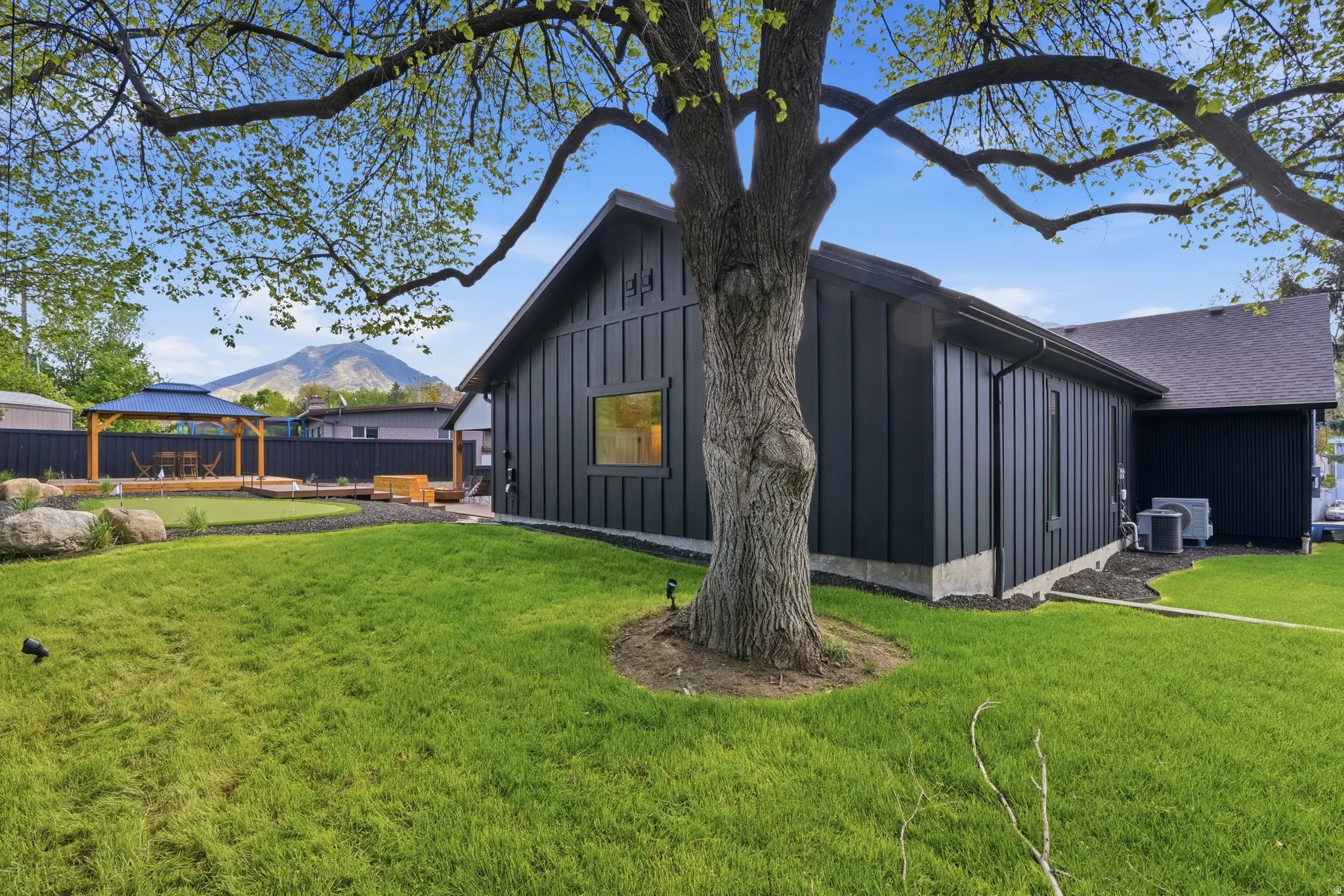 PLENTY ROOM GRASS AREA ON THE BACK AND SIDE OF HOME